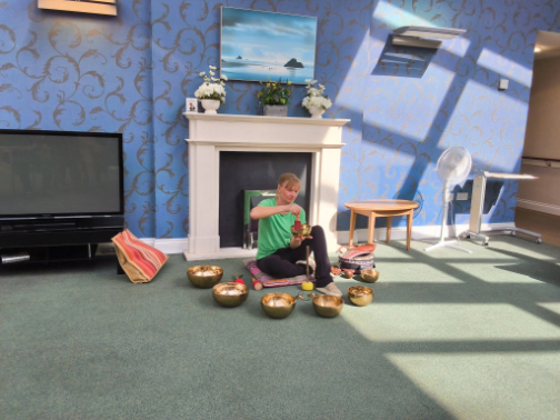 Sound bowl meditation session taking place at La Fontana Care Home